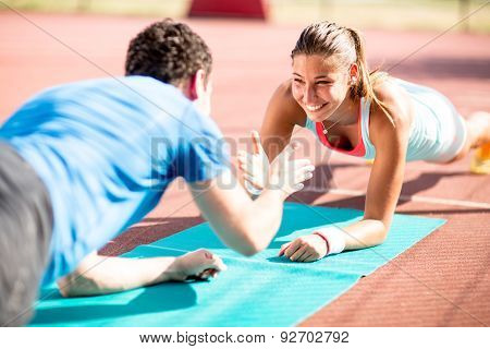 Woman Training With Personal Trainer
