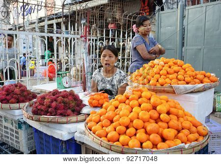 Burmese Women Selling Fresh Fruits At Bogyoke Market