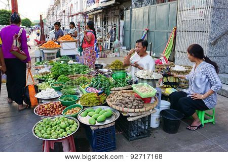 Burmese Women Selling Fresh Fruits At Bogyoke Market