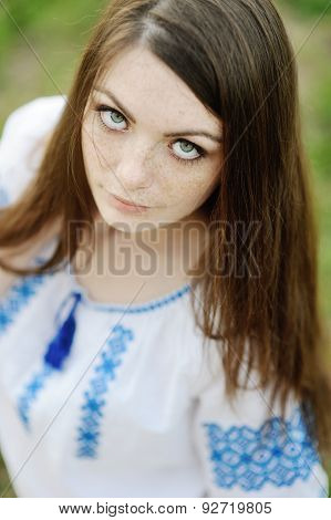 Girl With Freckles On Her Face In A Ukrainian Shirt