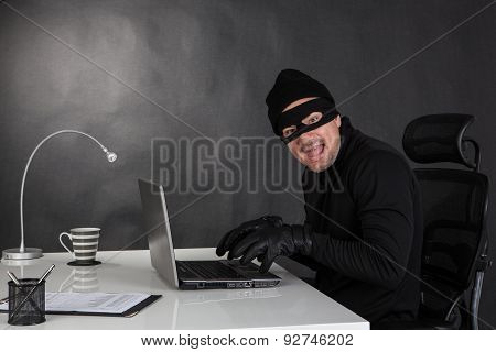 Hacker Stealing Data And Laughing