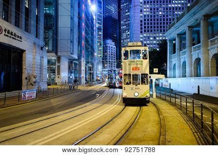 HONG KONG - JUNE 03, 2015: double-decker tram on street of HK. Hong Kong Tramways is a tram system in Hong Kong, being one of the earliest forms of public transport in the metropolis.