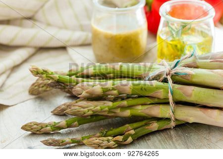 green asparagus with dressing