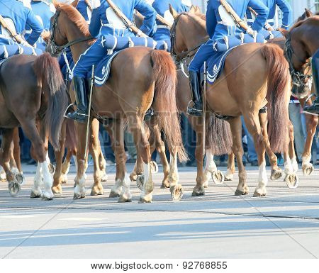 The Royal Guards In Blue Dresses On The Horse Back