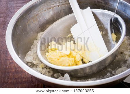 Cooking Home made ice cream in iced steel bowl