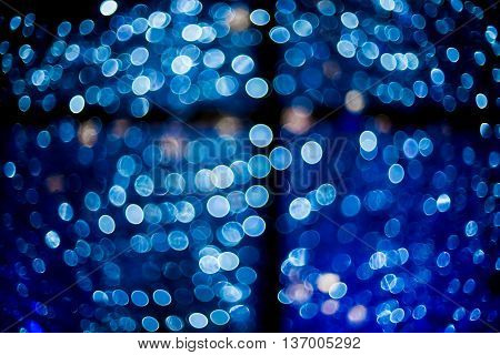 dark Blue disco light bokeh texture background.