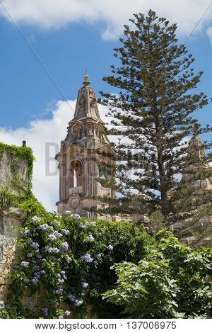 Naxxar parish church, viewed from Palazzo Parisio, Naxxar, Malta, Europe.  June 2016.