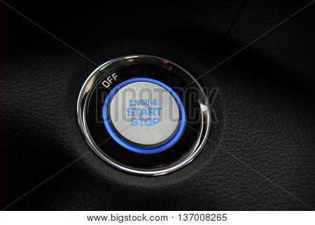 Start stop engine button on a modern car dashboard