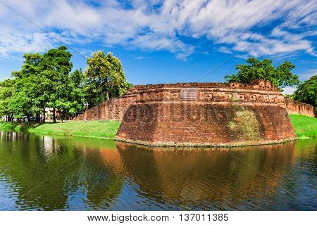 Chiang Mai, Thailand old city ancient wall and moat at Katam Corner.