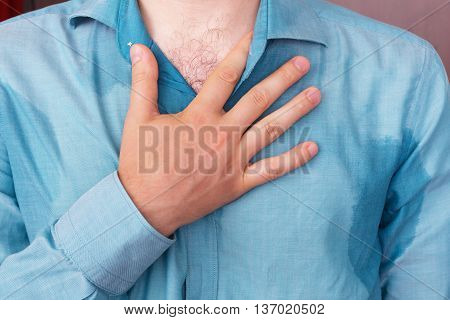 Sweaty Spot On The Shirt Because Of The Heat, Worries And Diffidence