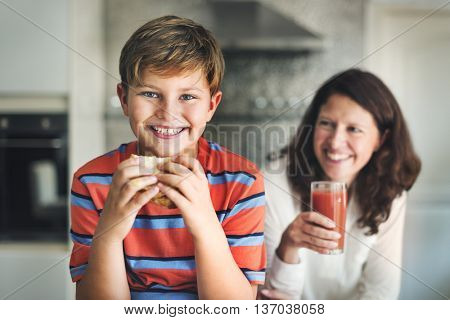 Mother Giving Food Son Concept