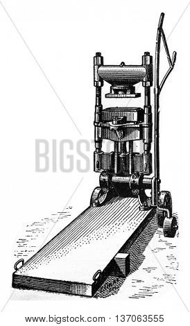 Press to reshuffle the bricks, vintage engraved illustration. Industrial encyclopedia E.-O. Lami - 1875.