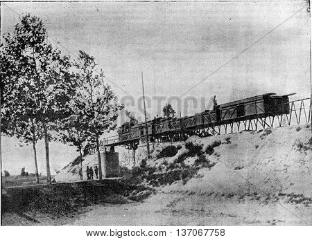 Lartigue Monorail, Feurs line to Panissieres, vintage engraved illustration. Industrial encyclopedia E.-O. Lami - 1875.
