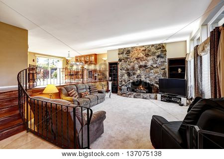 Luxury Open Living Room Interior With Stone Fireplace
