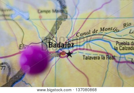 Pushpin marking on Badajoz Spain. Selective focus on city