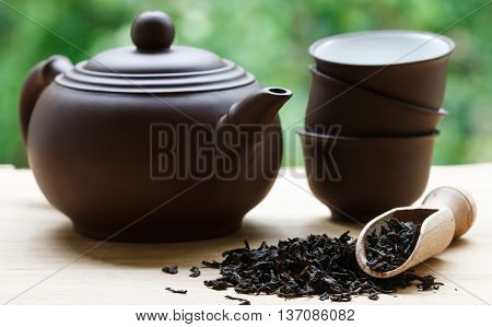Black Tea, Teapot And Cups On The Table