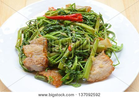 close up Fried Water minosa with crispy pork