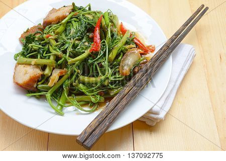 close up Fried Water minosa with crispy pork