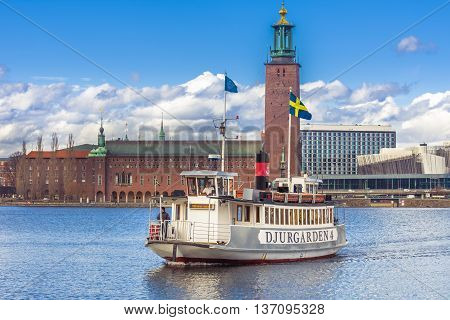 Stockholm, Sweden - March 30, 2016 Stockholm city old town. Ship sailing and transporting tourists on Gamla Stan the old town of Stockholm cityy