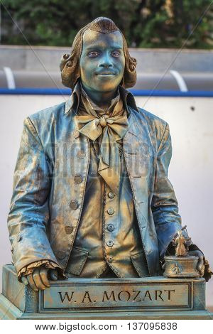 Bucharest ,Romania - June 10, 2016: W.A Mozart living statue at B-FIT in the Street. B-FIT is a cultural event that involves international artists and acrobats who act in theater plays on street.