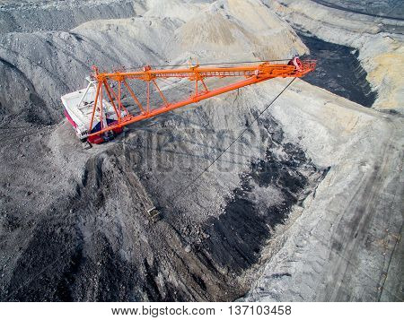 Dragline on open pit coal mine in Russia