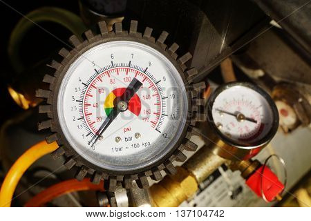 Air pressure gauge in a car workshop