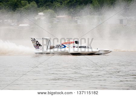 Madison Indiana - July 2 2016: Cal Phipps drives the Wiggins Racing U-27 in the Morgan Foods Unlimited Heat 1B at the Madison Regatta in Madison Indiana July 2 2016.