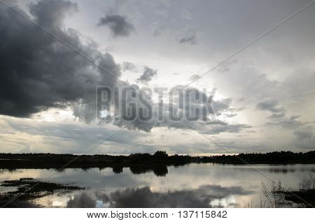 Stormy sky over the river nature background