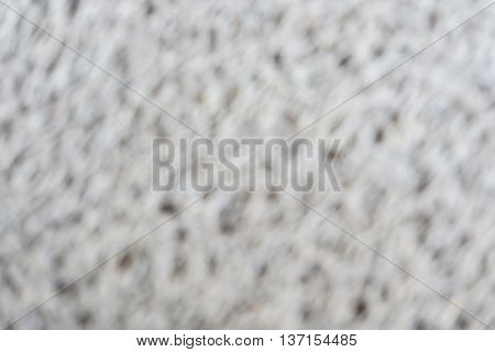 Blurred gray and black carpet background and texture.