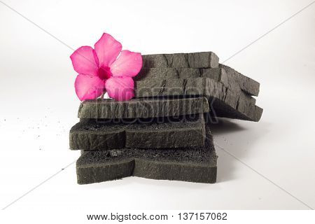 a slice charcoal bread with pink  flower