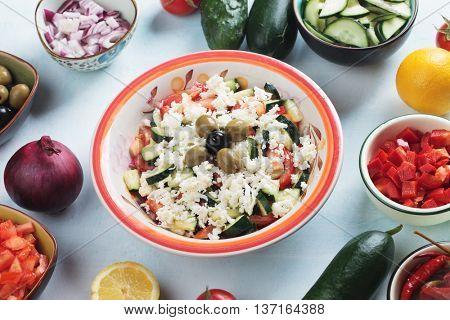 Shopska salad with cheese, olives, cucumber, tomato and onion