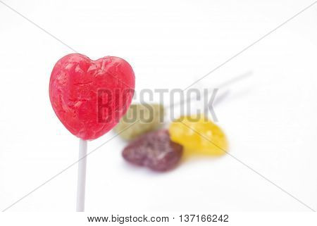 Heart shaped Lollipop Candy on white background