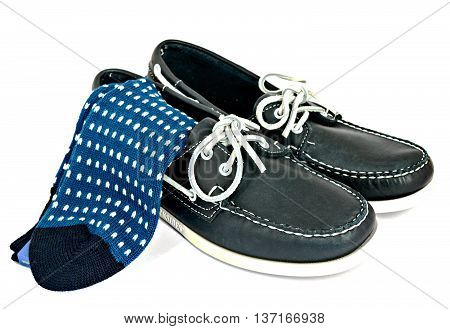 Blue Docksides deck shoes with hand-linked toes socks isolated on white