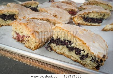 Closeup pile of fresh Irish tea scones arranged in basket