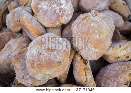 Closeup pile of fresh Irish tea scones arranged in basket