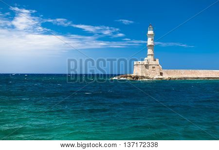 Lighthouse in the old harbor in city Chania. Island Crete. Creece
