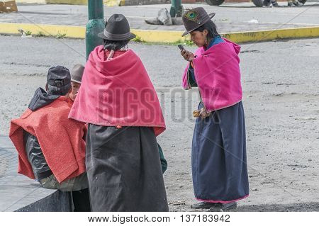 ALAUSI, ECUADOR, OCTOBER - 2015 - Group of native ecuadorian indigenous women dressing traditional clothes in Alausi Ecuador