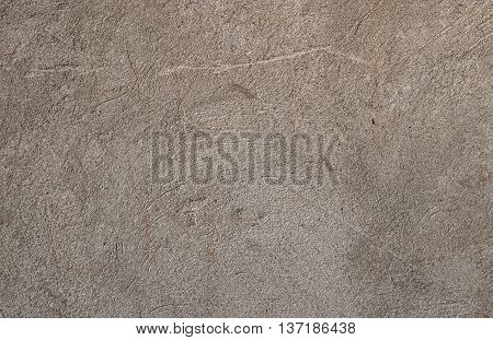 Old scratched outer wall decoration, warm gray color. texture