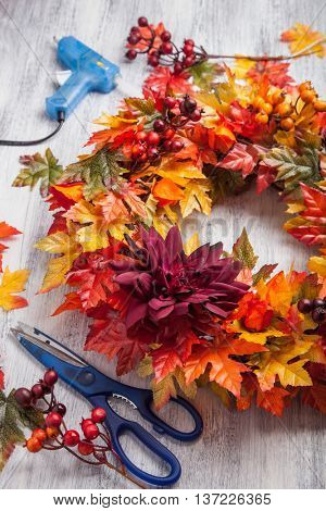 handmade diy artifical autumn wreath decoration with leaves berry flower