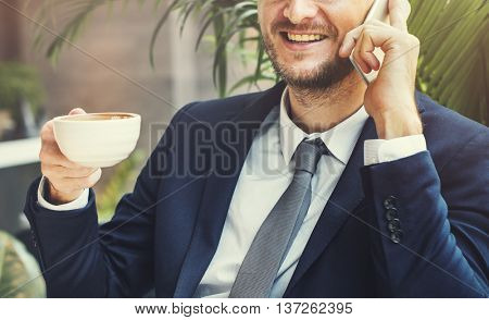 Sitting business Man Drinking Coffee