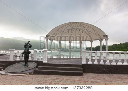 ABRAU-DURSO, RUSSIA - MAY 14, 2016: Pavilion and monument on the shore of Lake Abrau, Russia and a monument on the shore of Lake Abrau. Abrau-Dyurso is the center of Russia's most important wine-growing region