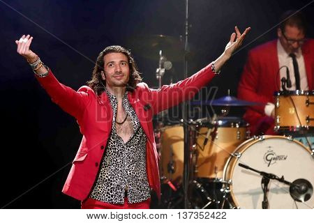 HUNTINGTON, NY-MAR 7: Singer Nasri (L) of the reggae fusion band Magic! performs in concert at The Paramount on March 7, 2015 in Huntington, New York.
