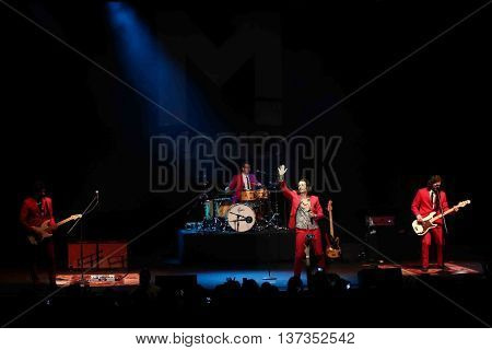 HUNTINGTON, NY-MAR 7: (L-R) Mark Pellizzer, Alex Tanas, Nasri and Ben Spivak of the reggae fusion band Magic! performs in concert at The Paramount on March 7, 2015 in Huntington, New York.