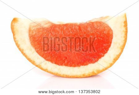 Slice of grapefruit on a white background