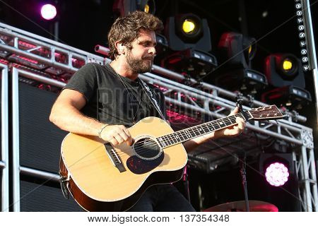 NASHVILLE-JUL 11: Country recording artist Thomas Rhett performs during Luke Bryan's 'Kick The Dust Up' Tour at Vanderbilt Stadium on July 11, 2015 in Nashville, Tennessee.