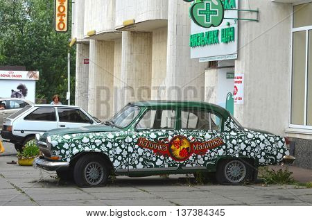  Exterior of the vintage Soviet car GAZ-21 Volga with folk stile tuning. July 6, 2016 in Kiev, Ukraine