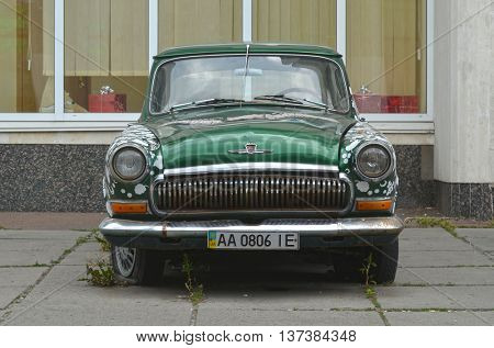  Exterior of the vintage Soviet car GAZ-21 Volga with folk stile tuning. July 6, 2016 in Kiev, Ukraine