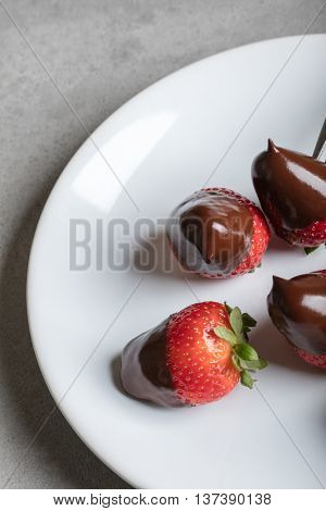 Juicy strawberry with milk chocolate