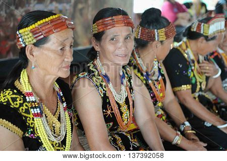 Sipitang Sabah Malaysia - Aug 30 2014:Murut lady in traditional costume decorated with colorful beads during folklore festival in Sipitang Sabah.Murut is among the largest ethnic group in Sabah interior.