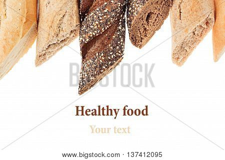 Cut baguette bread of different varieties on a white background. Rye wheat and whole grain bread. Isolated. Decorative frame of bread. Food background. Copy space.